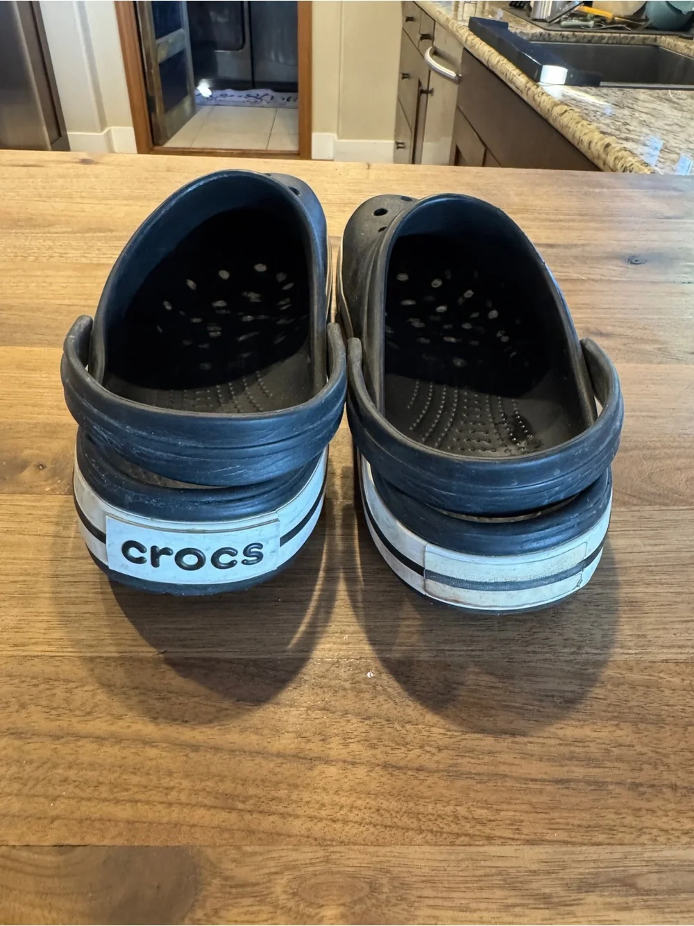 CROCS Black Clog Sandals with White Stripe